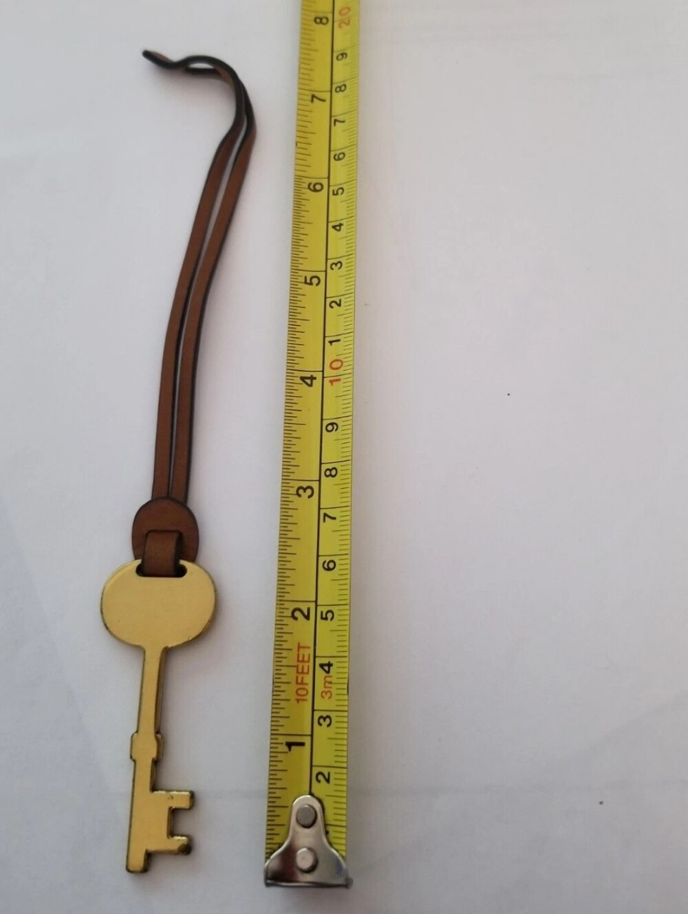 Fossil Brass Key Bag Charm